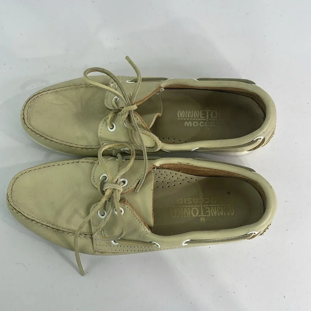 Minnetonka cream leather boat shoes, white sole